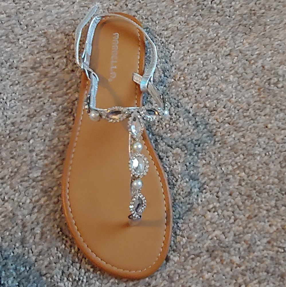 Rhinestoned sandals.